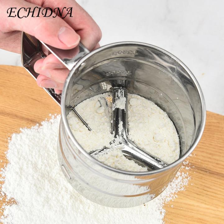 Stainless%20steel%20flour%20sieve,%20semi-automatic%20hand-held%20flour%20sieve,%20manual%20flour%20sieve%20for%20creative%20baking,%20hand-held%20flour%20strainer.%20-%20Image%206