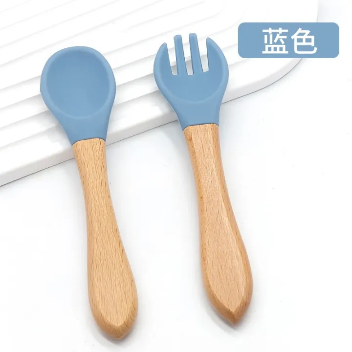 Children's%20Silicone%20Spoon%20with%20Wooden%20Handle%20Food%20Grade%20Soft%20Rubber%20Baby%20Feeding%20Tableware%20Can%20Bite%20Spork%20-%20Image%202