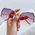 113 New personality diamond-cut rimless rimless sunglasses ladies retro irregular trend wear metal sunglasses uv400. 