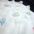 Handmade cotton baby shirts. 