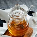 Transparent glass honey jar with lid Honey Jar with Dipper, Clear, 9 Ounces. 