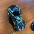 1PC Auto Dashboard Turning Racing Model Decoration Sports Car Drift Rotating Ornaments Car Individuality Center Console Accessories. 