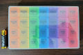 Four compartments daily pill organizer/storage multi colour. 