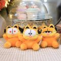 The Garfield Movie Anime Garfield Plush Doll Keychain Kawaii Series Ornaments Moe Cat Dog PP Cotton Garfield Plush Bag Pendant Soft  Ugly Cat Stuffed Toy Key Chain Manga Anime. 