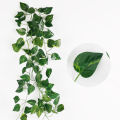 Green Leaf Banner Wall Background Artificial Hanging Plants for Wedding Party Garden Wall Decoration. 