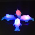 Baby Dolphin Bath Toys Kids Led Lighting Up Beach Toys Water Glowing Floating Toy for Children Luminous Swim Rubber Ducks Toys. 