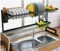 Double sink stainless steel dish drying rack over sink with cutlery holder. 