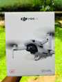 DJI Mini 4K, Drone with 4K UHD Camera for Adults, Under 249 g, 3-Axis Gimbal Stabilization, 10km Video Transmission, Auto Return, Wind Resistance, 31-Min Max Flight Time, Intelligent Flight. 