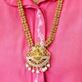 Gold color temple design long necklace set with silver color stone and off-white pearl for women and girl. 