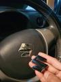 Suzuki steering wheel emblem. 
