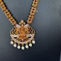 Gold color temple design long necklace set with silver color stone and off-white pearl for women and girl. 