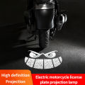 Motorcycle license plate projection light creative smiley face pattern projection warning light modified license plate light LED atmosphere light. 