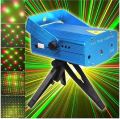 Multi Pattern Mini Laser Light Disco Light Projector Stage Lighting Table Lamp. 