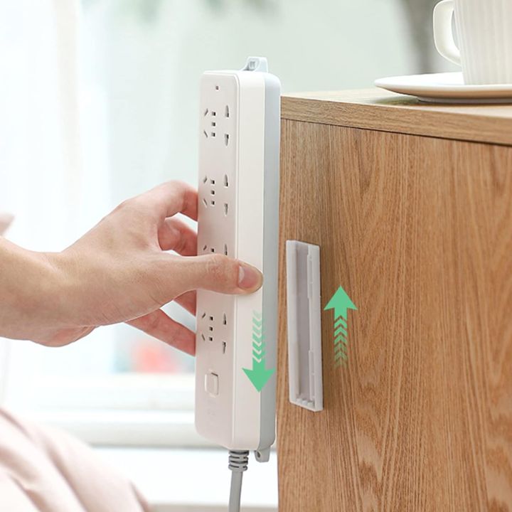 Self-Adhesive%20Desktop%20Socket%20Fixer,%202023%20New%20Adhesive%20Punch%20Free%20Socket%20Holder,%20Premium%20Wall-Mounted%20Plug%20Fixer%20Sticker%20Desktop%20mountable%20Plug-in%20Socket%20Fixer%20Bracket%20Stand%20-%20Image%205