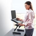 Stand and work with adjustable laptop desk AIR SPACE. 