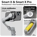 AOCHUAN Smart X Pro 3-Axis Foldable Handheld Gimbal Stabilizer with Fill Light Wireless Charging For Smart Phone Action Camera. 