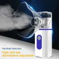 Handheld Nebulizer Atomizer Steam Inhaler Mesh Nebulizer. 