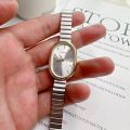 Oval Shaped Dial Women's Watch Luxury Alloy Strap Quartz Watch for Women Folding Clasp Versatile Small Wristwatch Clock 2023. 