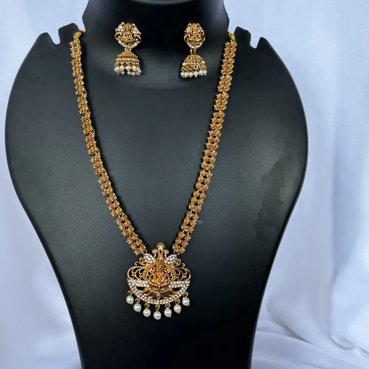 Gold%20color%20temple%20design%20long%20necklace%20set%20with%20silver%20color%20stone%20and%20off-white%20pearl%20for%20women%20and%20girl%20-%20Image%203