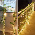 Auoyo 2M / 5M Fake Vines with 20 / 50 LED  Outdoor String Lights Artificial Plants Patio Decor Hanging Fake Ivy Greenery Garland Plants Fake Leaves For Balcony Decor / Outdoor Wall Decor / Garden Decor / Party. 