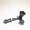 Articulating Friction Arm Wall Holder Mount Camera and Camera. 