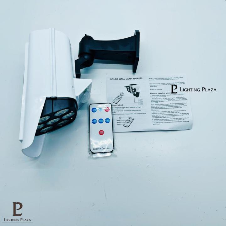 Solar%20Light%20(2%20%C3%97%20BATTERY)%20LED%20Solar%20Powered%20Lamp%20LED%20COB%20-%20CCTV%20Camera%20Model%20-%20Security%20-%20Solar%20Light%20Outdoor%20Street%20Spotlight%20-%20Garden%20Solar%20Wall%20Lamp%20-%20Image%204