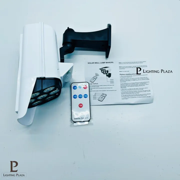 Solar%20Light%20(2%20%C3%97%20BATTERY)%20LED%20Solar%20Powered%20Lamp%20LED%20COB%20-%20CCTV%20Camera%20Model%20-%20Security%20-%20Solar%20Light%20Outdoor%20Street%20Spotlight%20-%20Garden%20Solar%20Wall%20Lamp%20-%20Image%204