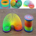 Plastic Slinky Rainbow Spring Classic Toy Colorful Magic Plastic Circle Folding Educational Toys for Children Kids. 