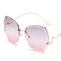 113 New personality diamond-cut rimless rimless sunglasses ladies retro irregular trend wear metal sunglasses uv400. 