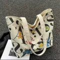 Large-Capacity Canvas Tote Shoulder Bag, Washable Fashionable Messenger Bag for Boys and Girls. 