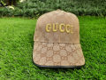 Gucci Cap with Embroidered Letters. 