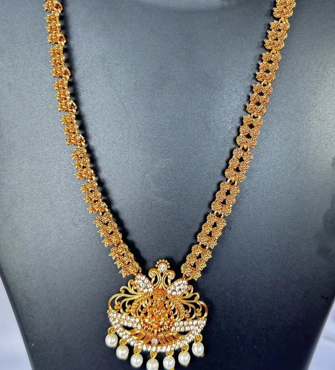 Gold%20color%20temple%20design%20long%20necklace%20set%20with%20silver%20color%20stone%20and%20off-white%20pearl%20for%20women%20and%20girl%20-%20Image%204