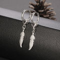 Qingwen Feather titanium steel earrings for men set ear piercing Stainless steel earrings cool hypoallergenic iareng for men kpop round airing hikaw for boys 925 silver earings for men on sale. 