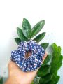 Floral printed scrunchies , unique girl hair accessories , hair and hand scrunchies , new scrunchie styles 2024. 