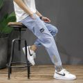 Summer Thin Workwear Pants Men's Casual Pants Spring and Autumn Loose Denim Trousers Men's Ankle-Tied Sports Ninth Pants. 