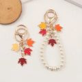 【HOT】 Elegant Maple Leaf Wristlet Keychain Cute Pearl Pendant With Keyrings For Women Keys Phones Creative DIY Wallets Decoration. 