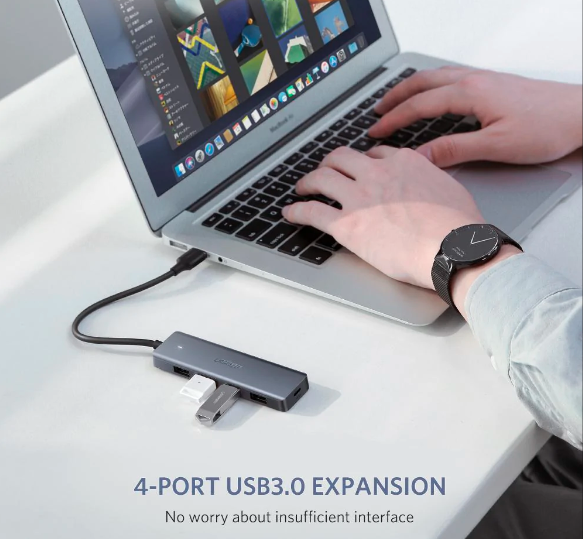 UGREEN%204%20Port%20USB%203.0%20Hub%20Ultra%20Slim%20High-Speed%20Splitter%20/%20USB%203.0%20Power%20Supply%20/%20Speed%20Up%20To%205Gbps%20/%20Support%2010TB%20Hard%20Drive%20/%20Data%20Transfer%20/%20Compatible%20With%20Windows,%20Mac%20OS%20(50985)%20-%20Image%202