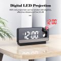 Digital LED projection clock temperature and date display. 