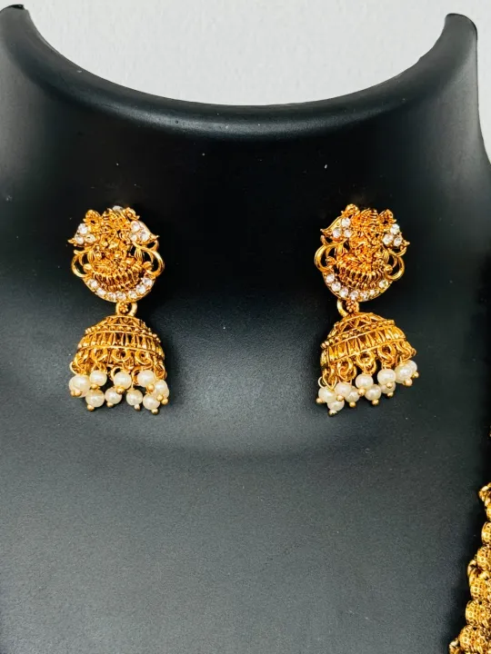 Gold%20color%20temple%20design%20long%20necklace%20set%20with%20silver%20color%20stone%20and%20off-white%20pearl%20for%20women%20and%20girl%20-%20Image%209