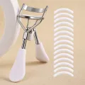1 Portable Eyelash Curler with 15 Silicone Pads, Stainless Steel Curved Handle Eyelash Curler, Curl and Shape, No Damage to Eyelashes, Eyelash Lifting, Big Eyes, Suitable for Women's Eyelashes. 