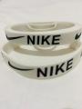 Nike Embossed White Wrist Band. 
