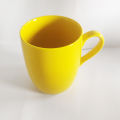 Royal porcelain yellow tea mug. 