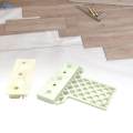 Laminate Flooring Spacer for Floating Floor Installation Subfloor Panels. 