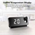 Digital LED projection clock temperature and date display. 