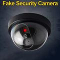 Smart Indoor/Outdoor Dummy Surveillance Camera Home Dome Waterproof Fake CCTV Security Camera with Flashing Red LED Lights. 