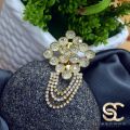 Imported Quality white stones gold color saree brooch with hanging chains Superb finishing It makes the perfect gift for your loved ones. 