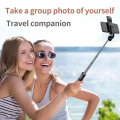 360° Rotating Selfie Stick with Built-in Light, Tripod Mount, and Wireless Operation - Black Plastic Selfie Stick for Group Photos, Travel, and Events, Selfie Stick for Phone, Event Photography, Sleek Design, Durable Construction. 