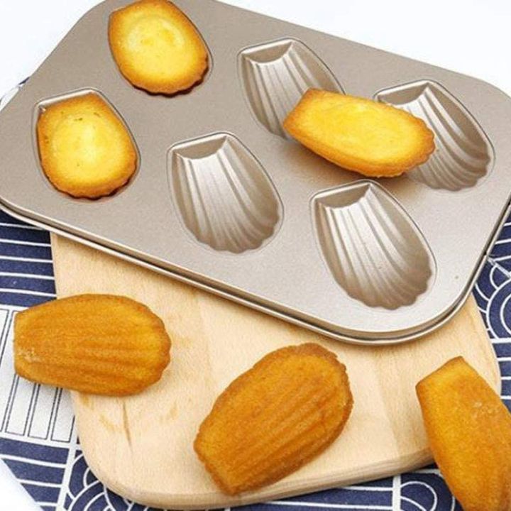 2%20Pack%20Madeleine%20Mold%20Cake%20Pan,%20Non-Stick%20Heavy%20Duty%20Shell%20Madeline%20Bakeware%20for%20Oven%20Baking%20(Gold)%20-%20Image%204