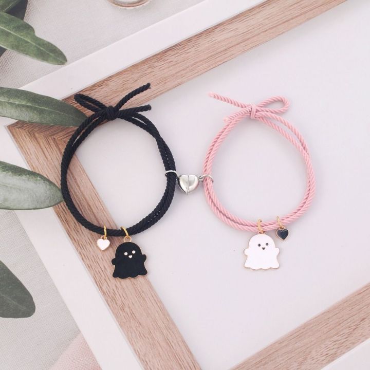 Trendy%20Black%20and%20White%20Halloween%20Couple%20Bracelets%20with%20Love%20Heart%20Pendant%20-%20Adjustable%20Rubber%20Band,%20Matching%20Set%20-%20Image%208