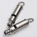 Long whistle made of metal. 